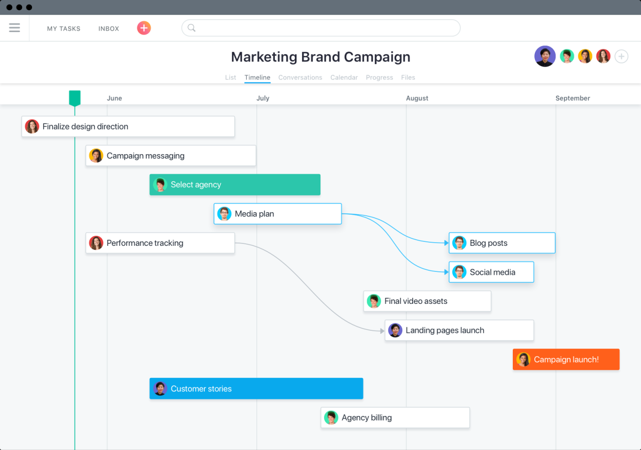 Thoughtful young bearded manager typing on keyboard while working on ...